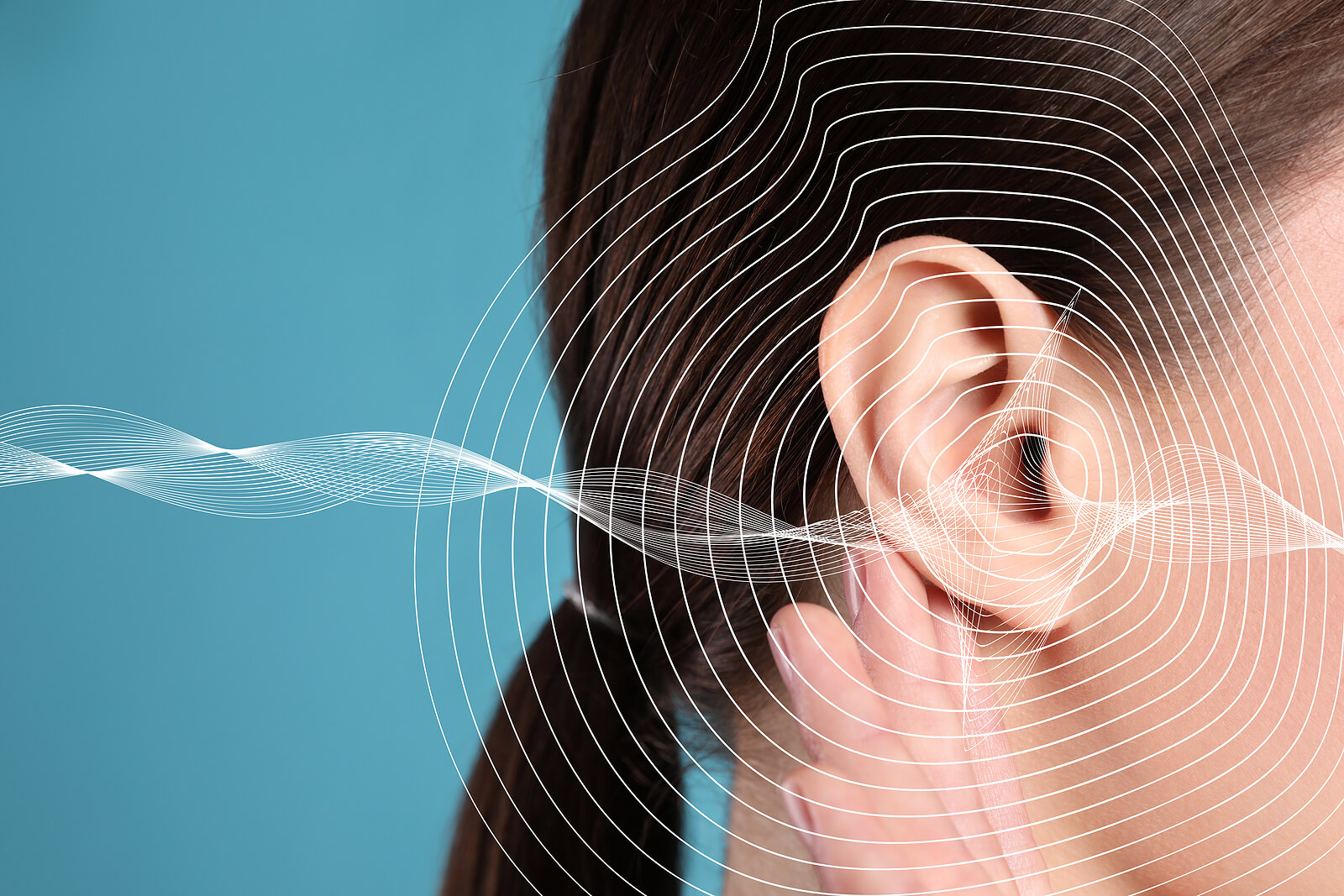 Woman's ear with sound vector
